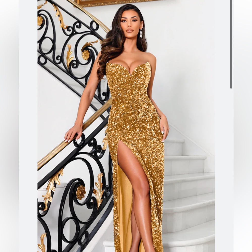 Gold sequin strapless dress. Wore once for a wedding. Size 6 but fits like a 4